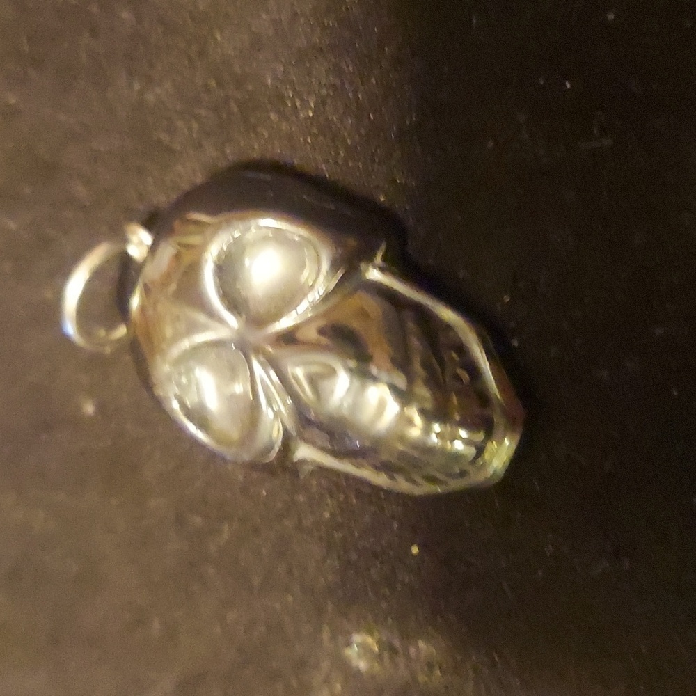 Hematite skull pendant. Healing crystal jewelery.